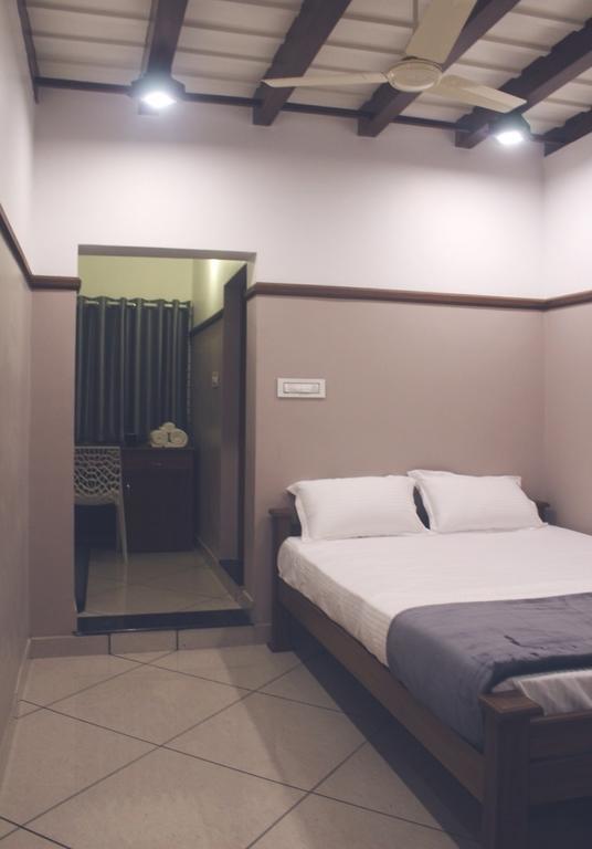 Icon Residency Hotel Kalpetta Bilik gambar